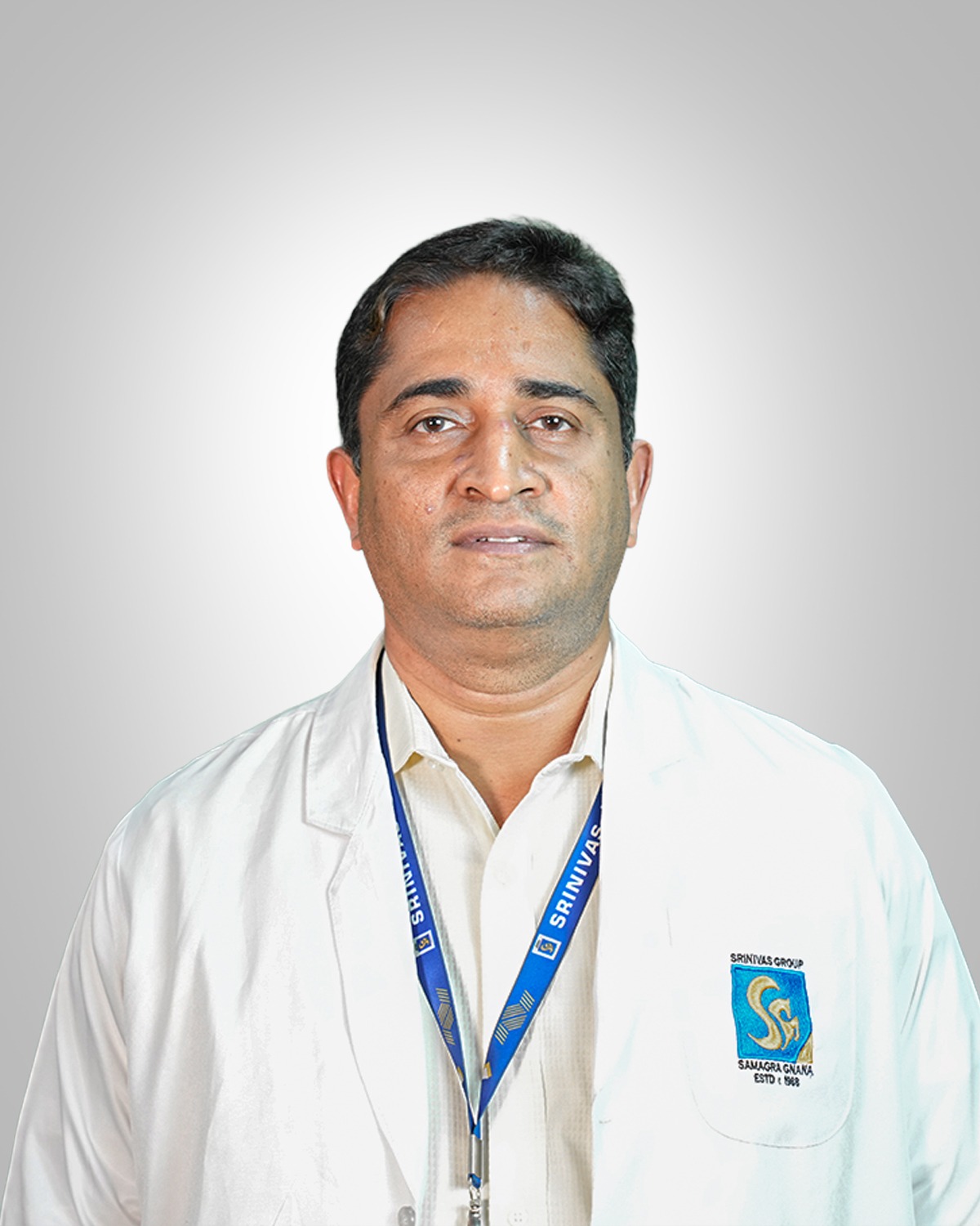 Dr. Dinesh K. V